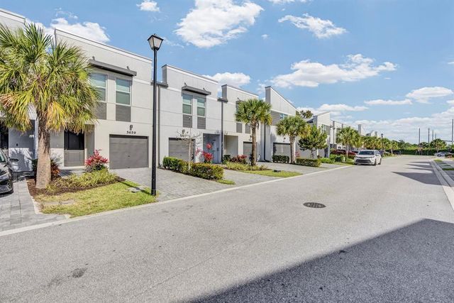 5659 Enclave Drive, Mangonia Park, FL 33407
