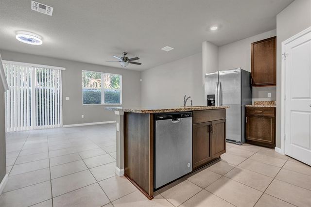 5659 Enclave Drive, Mangonia Park, FL 33407
