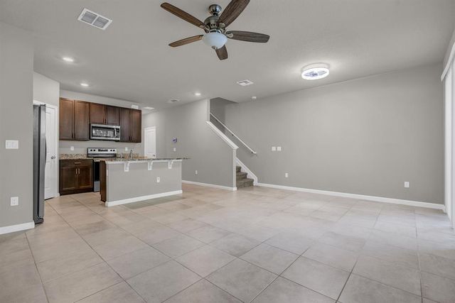 5659 Enclave Drive, Mangonia Park, FL 33407