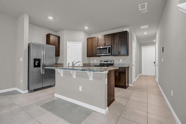 5659 Enclave Drive, Mangonia Park, FL 33407