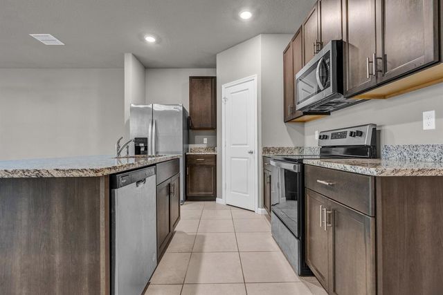 5659 Enclave Drive, Mangonia Park, FL 33407