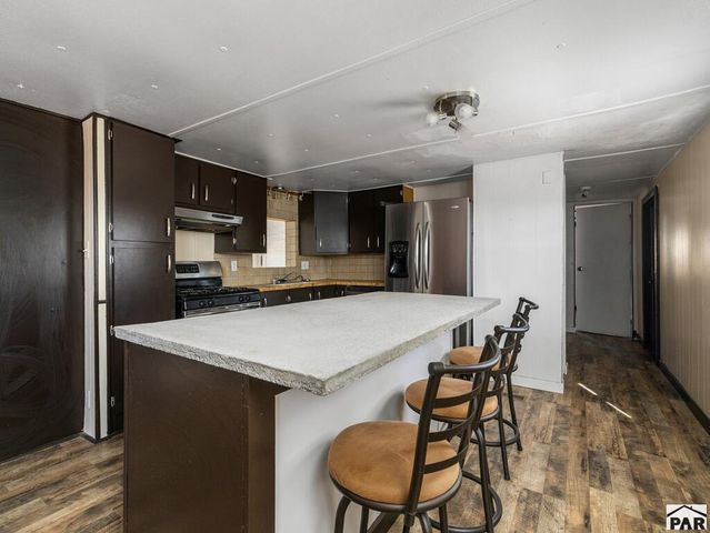 387 E Stewart Dr, Pueblo West, CO 81007