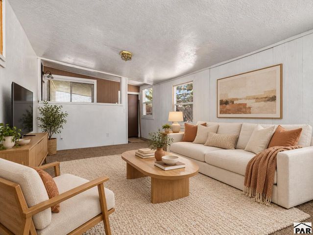 387 E Stewart Dr, Pueblo West, CO 81007