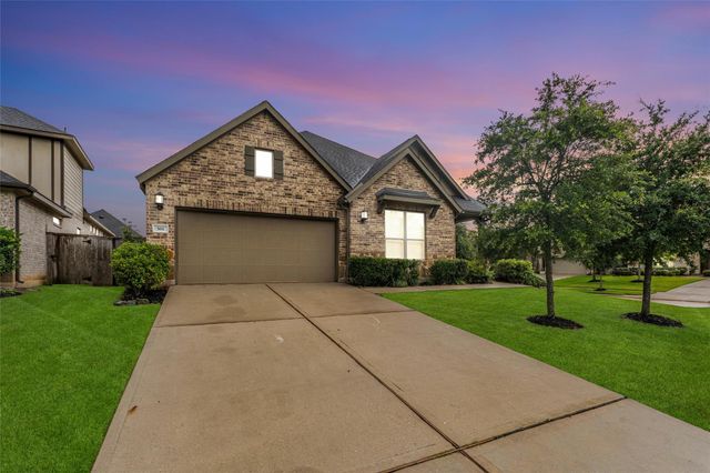 561 Rolling Brook Lane, Pinehurst, TX 77362