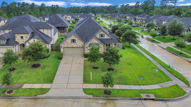 561 Rolling Brook Lane, Pinehurst, TX 77362