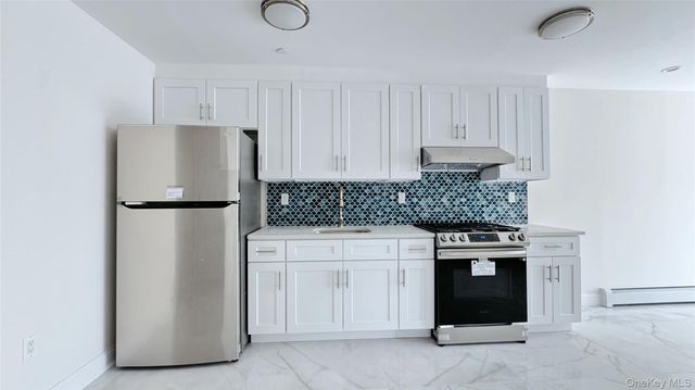 107-47 49th Ave, Corona, NY 11368