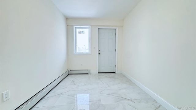 107-47 49th Ave, Corona, NY 11368