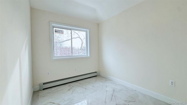 107-47 49th Ave, Corona, NY 11368