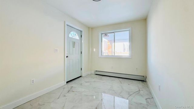 107-47 49th Ave, Corona, NY 11368