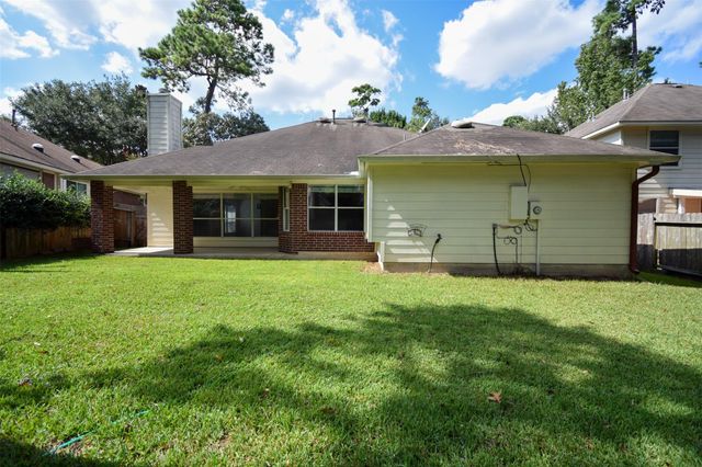 34 S Rambling Ridge Place, Conroe, TX 77385