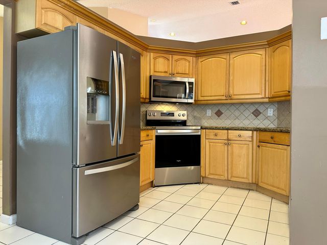 386 Carrington Drive, Weston, FL 33326