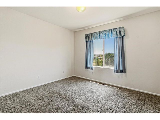 9874 N Crystal Lake Dr, Littleton, CO 80125