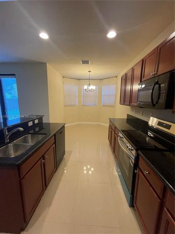 10417 SW 231st Ter, Miami, FL 33190