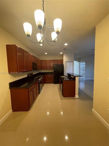 10417 SW 231st Ter, Miami, FL 33190