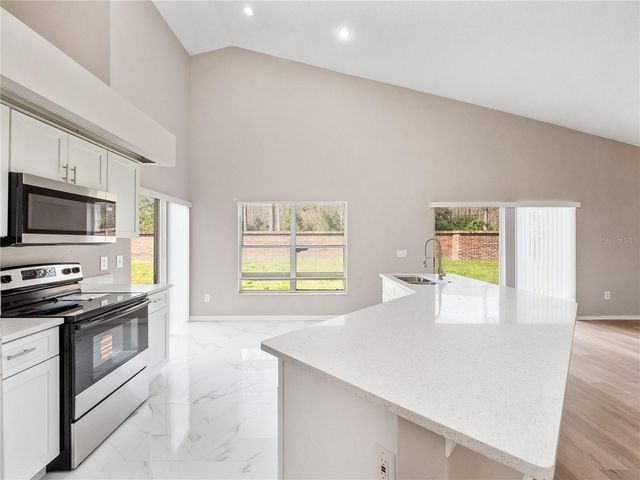 14904 WILD WOOD LILY COURT, Orlando, FL 32824
