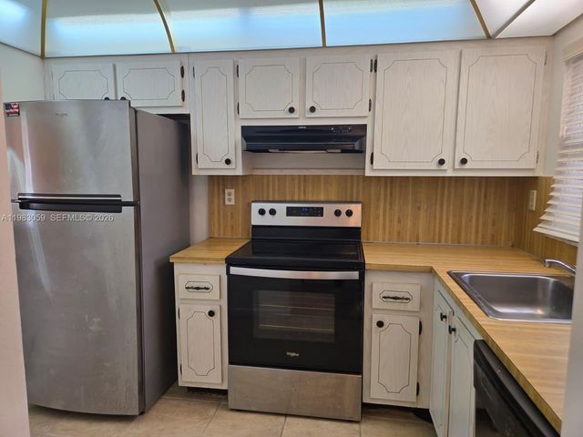 9261 Sunrise Lakes Boulevard 201, Sunrise, FL 33322