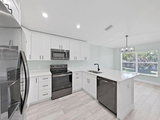1025 LAKE AVOCA PLACE, Tarpon Springs, FL 34689