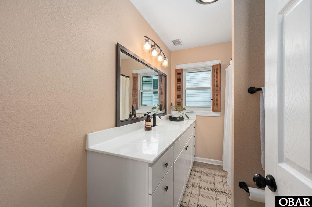 Image 16 of property listing at 614 Croatan Avenue, Manteo, NC 27954