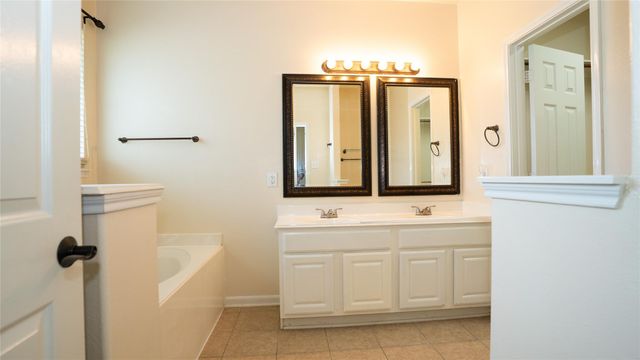 11922 Champions Walk Ln Lane, Houston, TX 77066