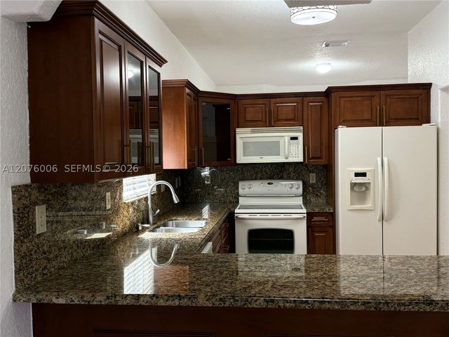15957 SW 54th Ter, Miami, FL 33185