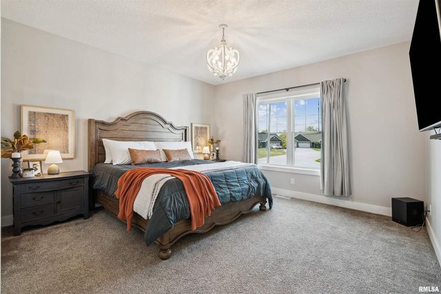 783 SWEET WOOD Lane, Blue Grass, IA 52726