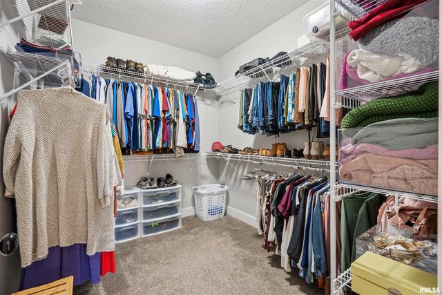 783 SWEET WOOD Lane, Blue Grass, IA 52726