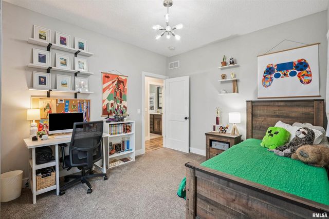 783 SWEET WOOD Lane, Blue Grass, IA 52726