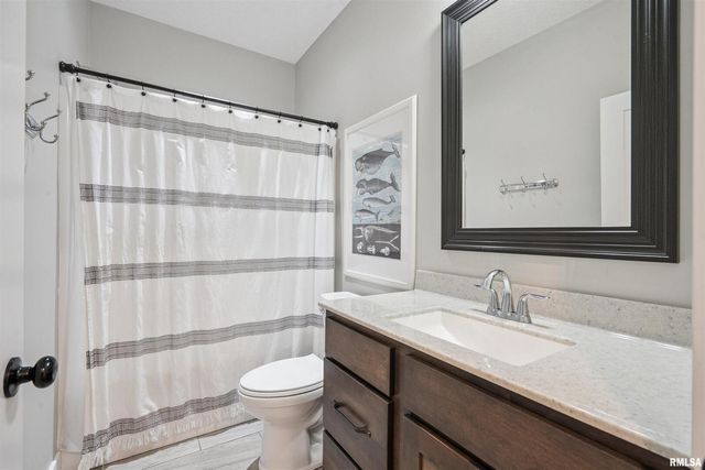 783 SWEET WOOD Lane, Blue Grass, IA 52726