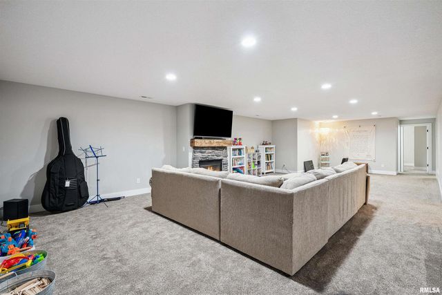 783 SWEET WOOD Lane, Blue Grass, IA 52726