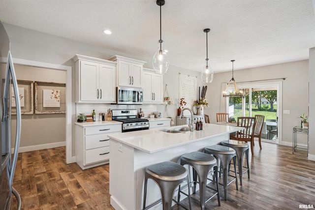 783 SWEET WOOD Lane, Blue Grass, IA 52726