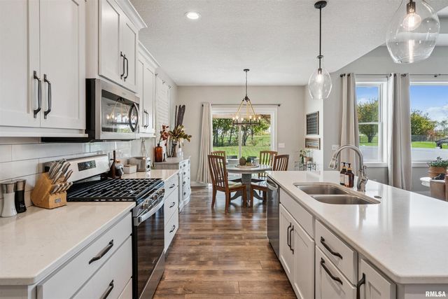 783 SWEET WOOD Lane, Blue Grass, IA 52726