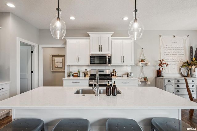 783 SWEET WOOD Lane, Blue Grass, IA 52726