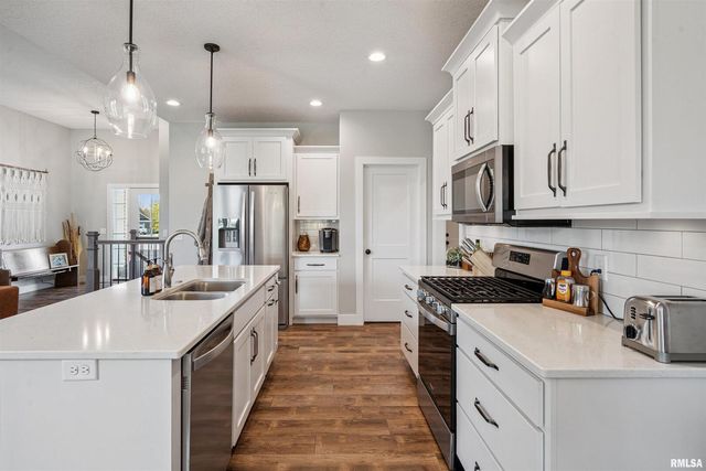 783 SWEET WOOD Lane, Blue Grass, IA 52726