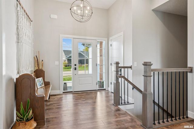 783 SWEET WOOD Lane, Blue Grass, IA 52726