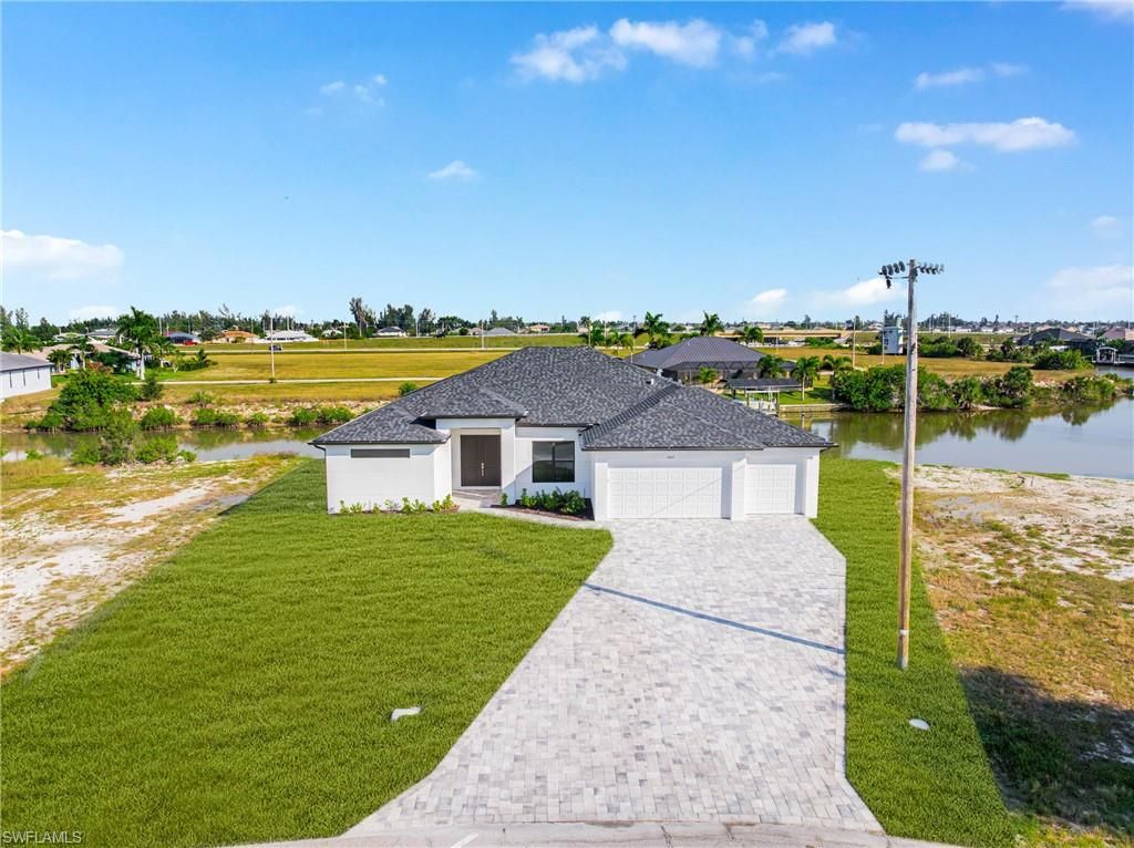 1003 NW 33rd AVE, CAPE CORAL, FL 33993 — photo 4