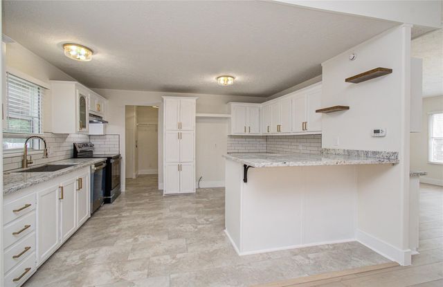 4537 Grand Oaks Drive, Willis, TX 77378