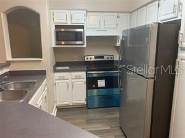 6413 ASTOR VILLAGE AVENUE 212, Orlando, FL 32835