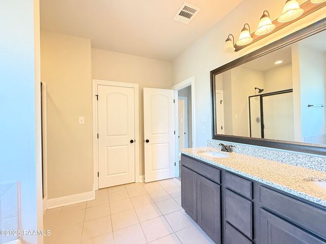 206 Caillou Grove Road, Youngsville, LA 70592