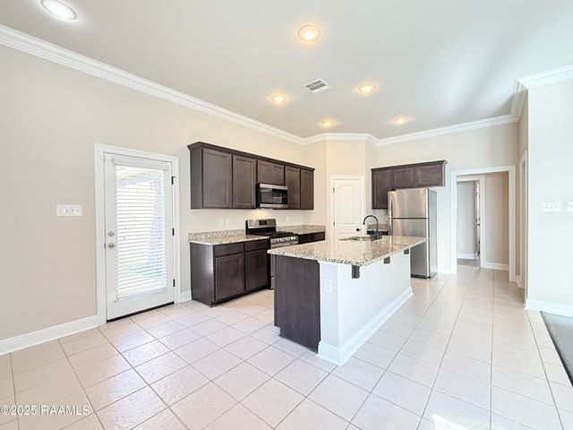 206 Caillou Grove Road, Youngsville, LA 70592