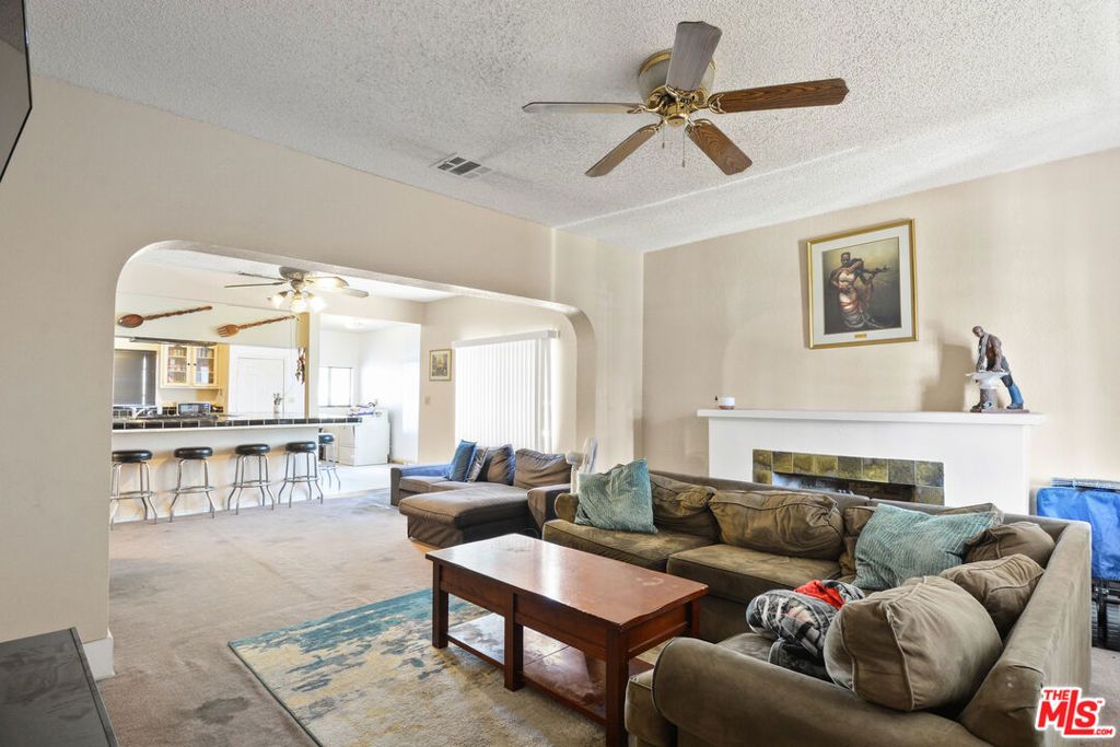 Image 1 of property listing at 1345 W 54th Street, Los Angeles, CA 90037