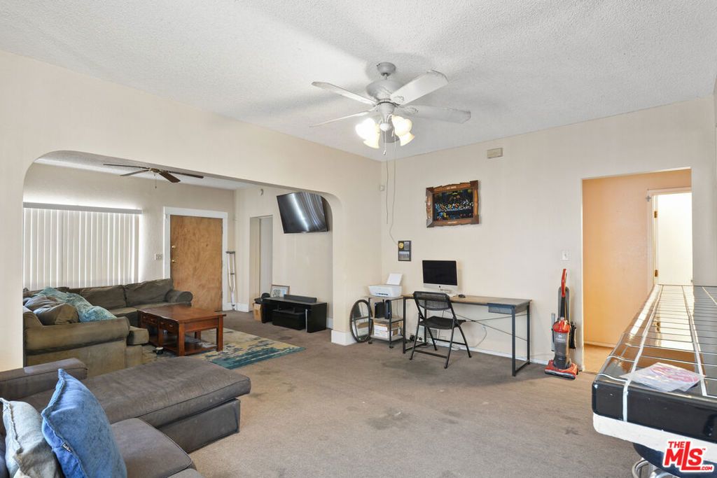 Image 2 of property listing at 1345 W 54th Street, Los Angeles, CA 90037