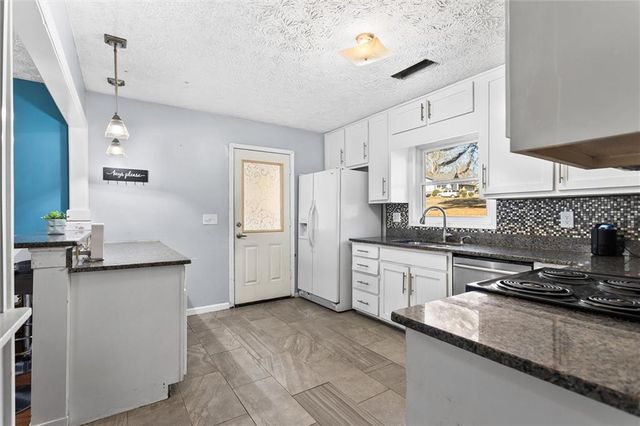 3283 Kimberly Woods SW Court, Lilburn, GA 30047