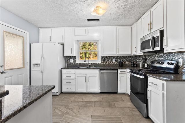 3283 Kimberly Woods SW Court, Lilburn, GA 30047