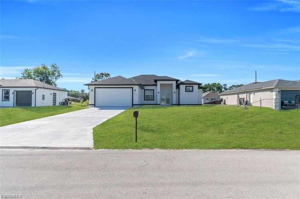 194 Bell BLVD S, LEHIGH ACRES, FL 33974 — exterior