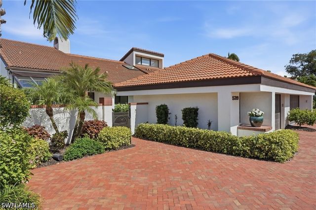 539 Bay Villas LN 101, Naples, FL 34108