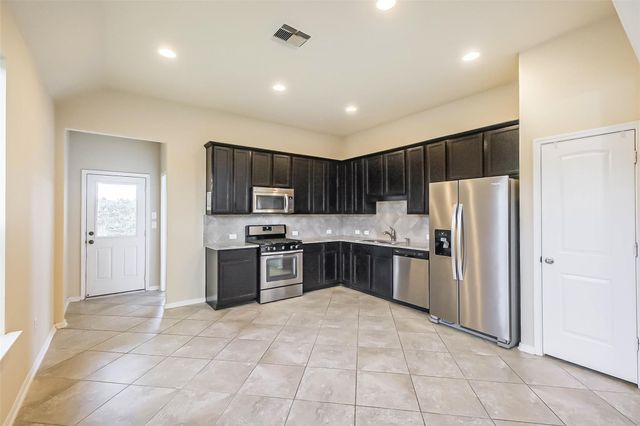 10103 Blue Point Juniper Drive, Houston, TX 77075