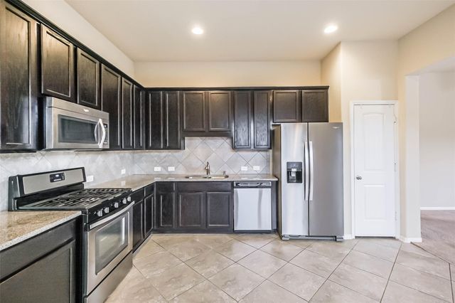 10103 Blue Point Juniper Drive, Houston, TX 77075