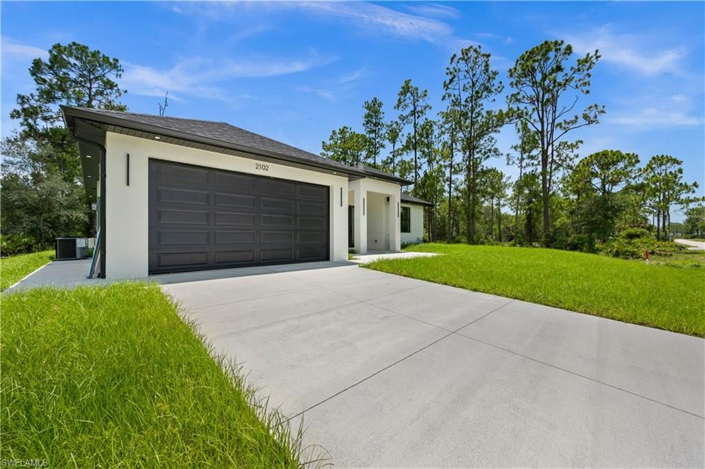 2102 E 13th ST, LEHIGH ACRES, FL 33972 — photo 4