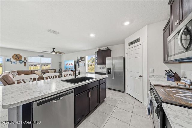 3250 Burrowing Owl Drive, Mims, FL 32754