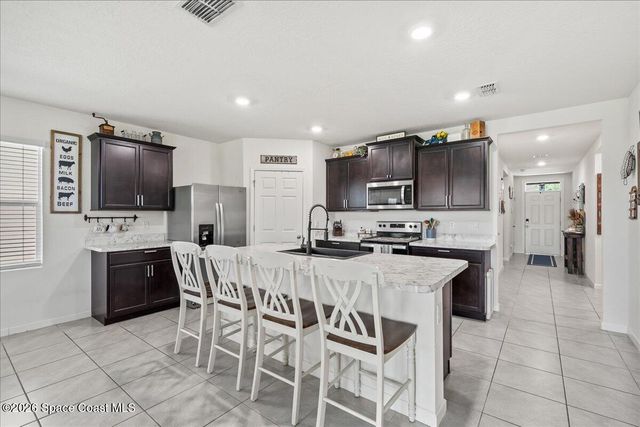3250 Burrowing Owl Drive, Mims, FL 32754